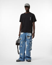 Load image into Gallery viewer, Ripped Ultracargo Denim Trousers | Men Trousers New Light Blue | GCDS Spring/Summer 2023

